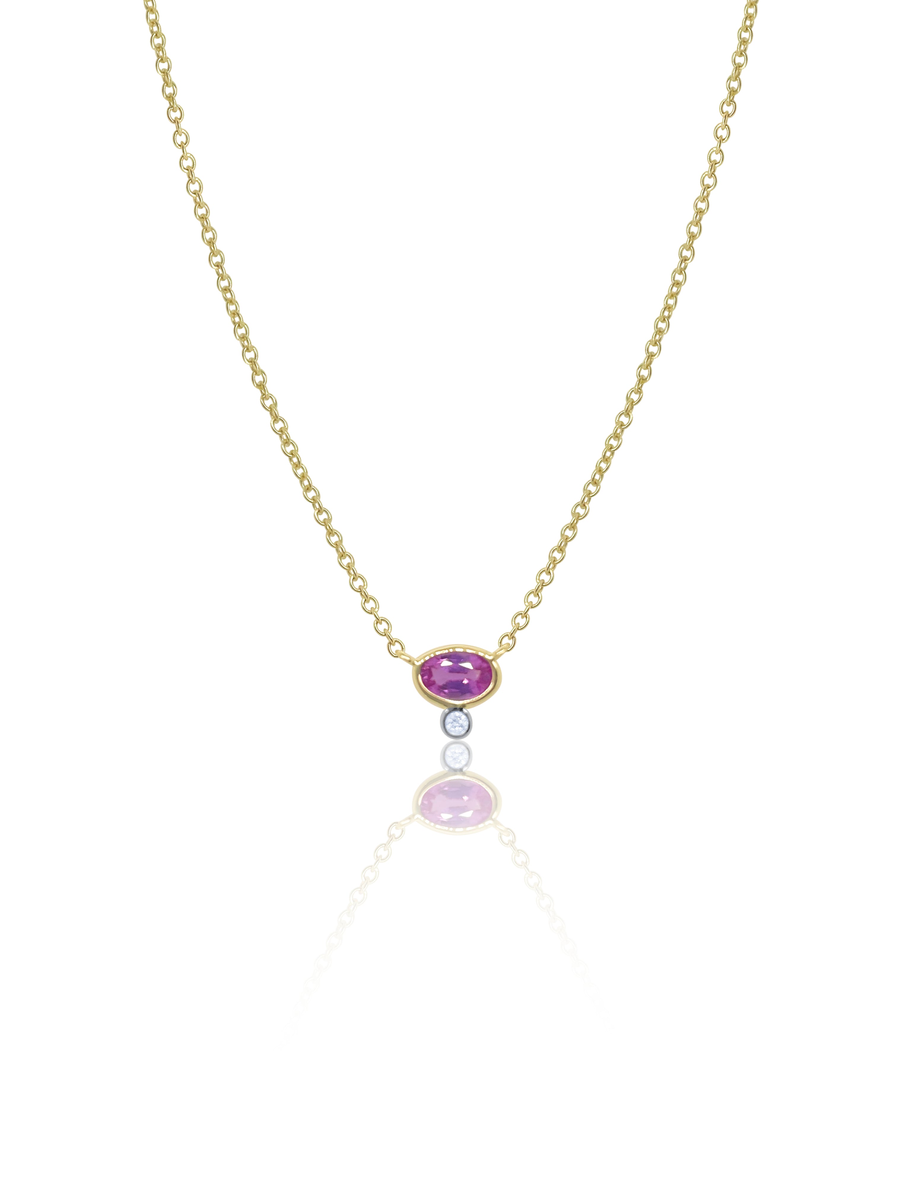 yellow gold necklace with centered pink sapphire and diamond bezel