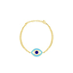 yellow gold double chained and light blue and navy evil eye bracelet