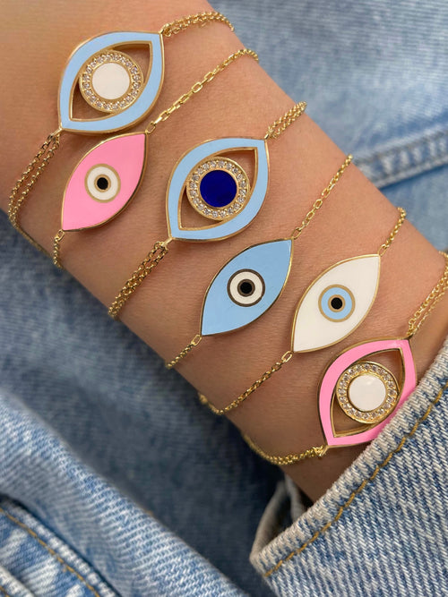 yellow gold double chained and light blue evil eye bracelet 