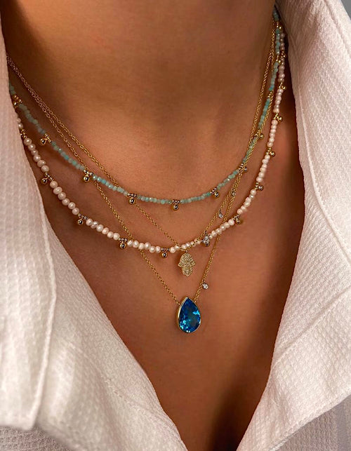 Aquamarine Bead and Gold Plated Ball Drop Necklace.