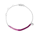 white gold and ruby beaded bracelet