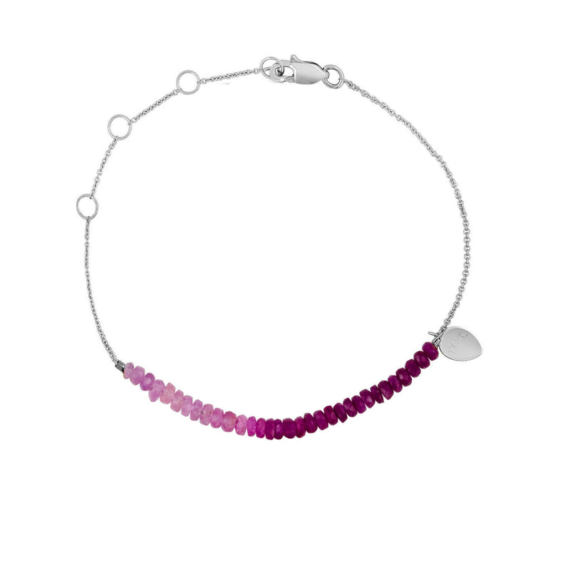 white gold and ruby beaded bracelet