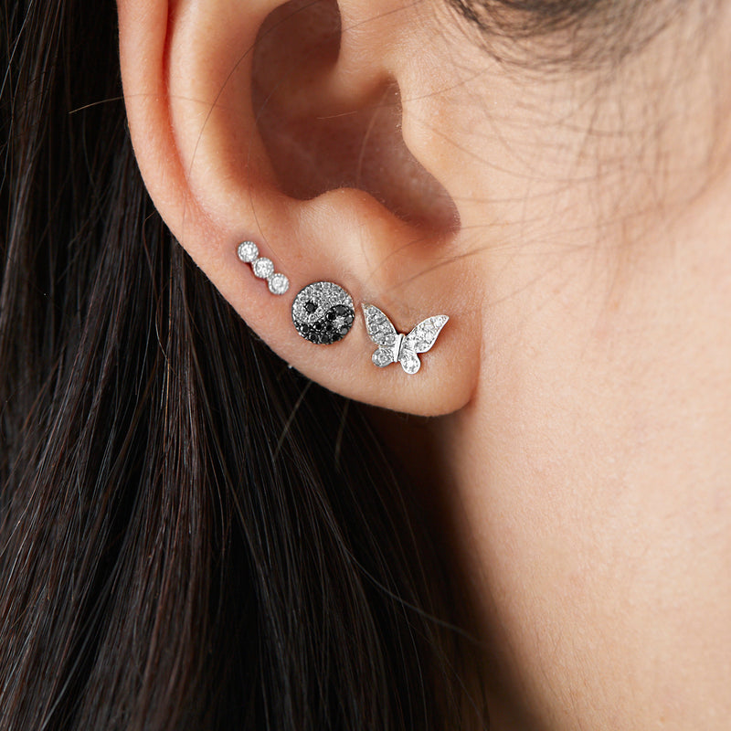 white gold diamond encrusted butterfly studs