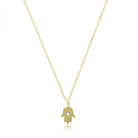 yellow gold hamsa hand necklace with centered diamond bezel