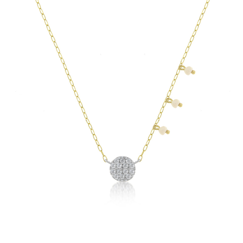 yellow gold necklace with diamond disk and off-centered pearls