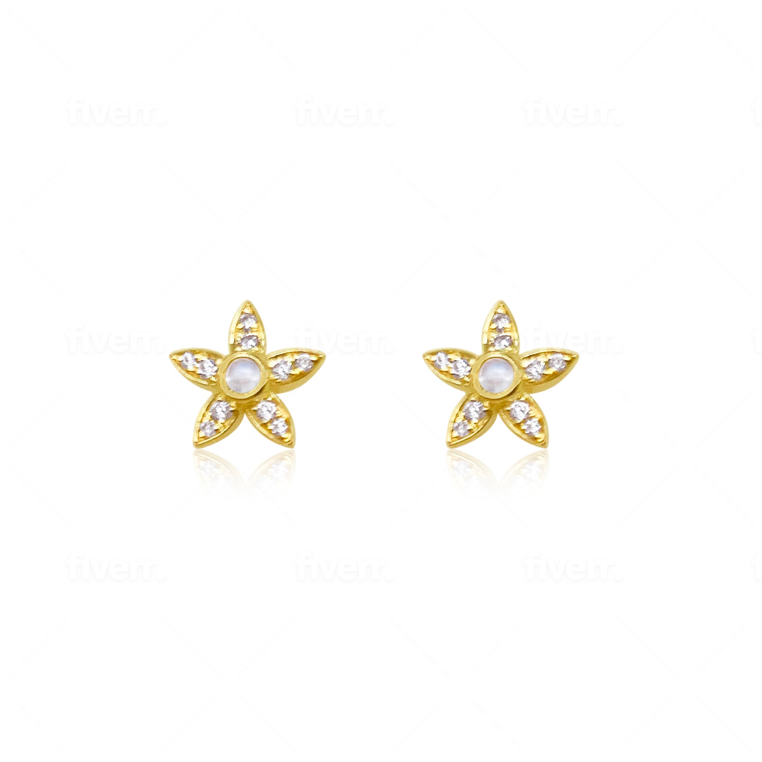 yellow gold and diamond studs with centered moonstone
