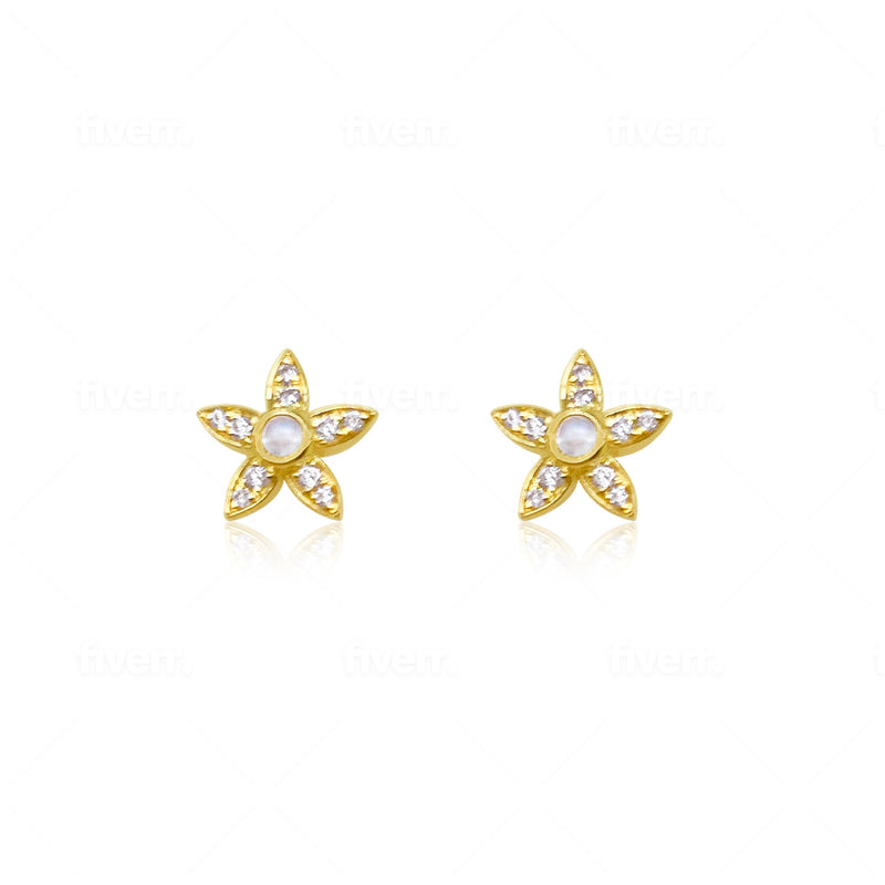 yellow gold and diamond studs with centered moonstone