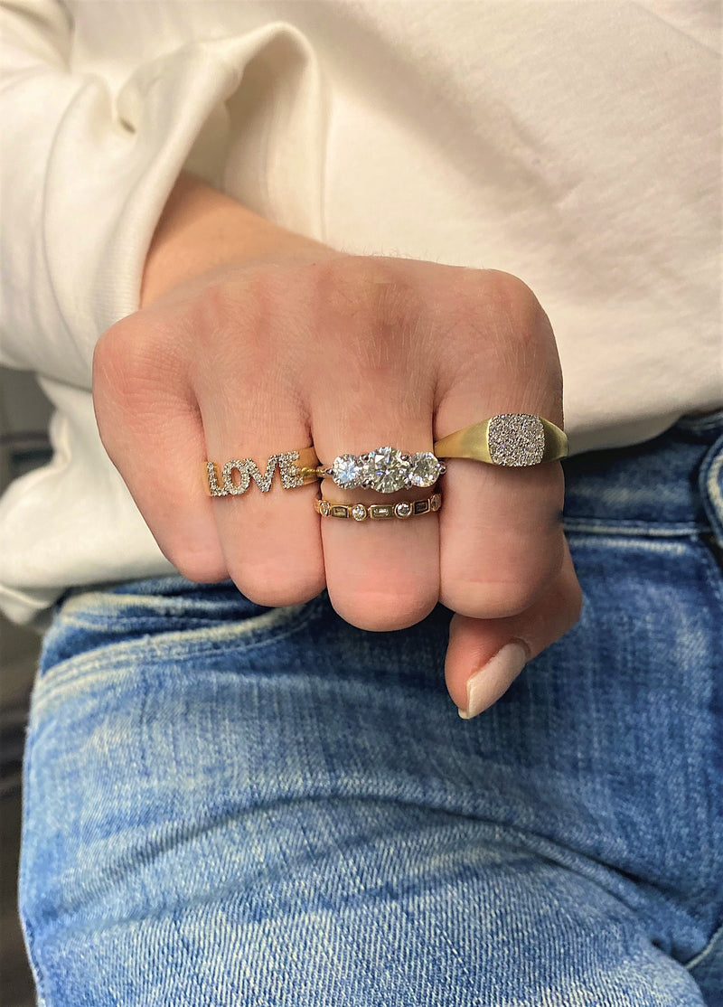 yellow gold and diamond "love" ring