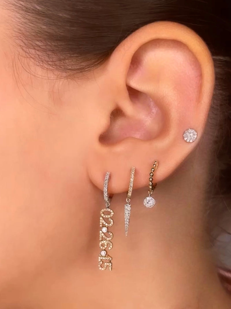 white gold and diamond hoops with dangling spike