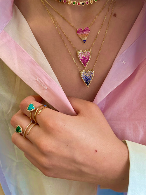 yellow gold neck with pink sapphire and diamond heart