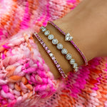 pink sapphire and diamond on rose gold tennis bracelet