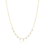 yellow gold choker with diamond bezels