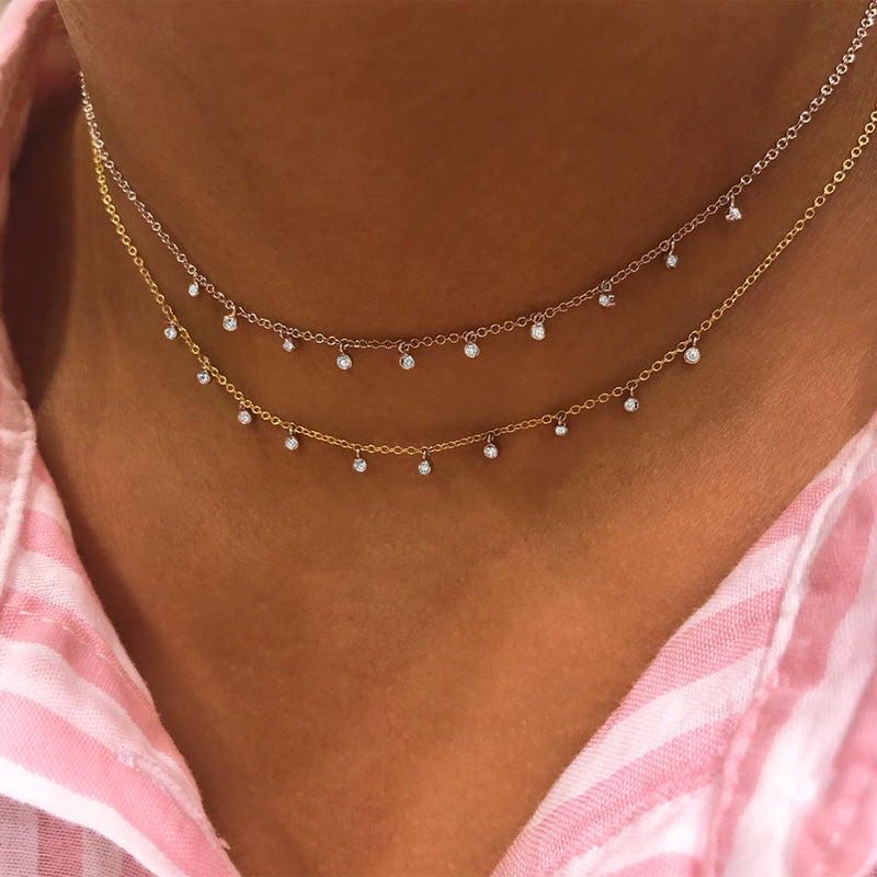 white gold choker with diamond bezels