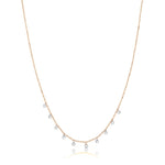 yellow gold choker with diamond bezels